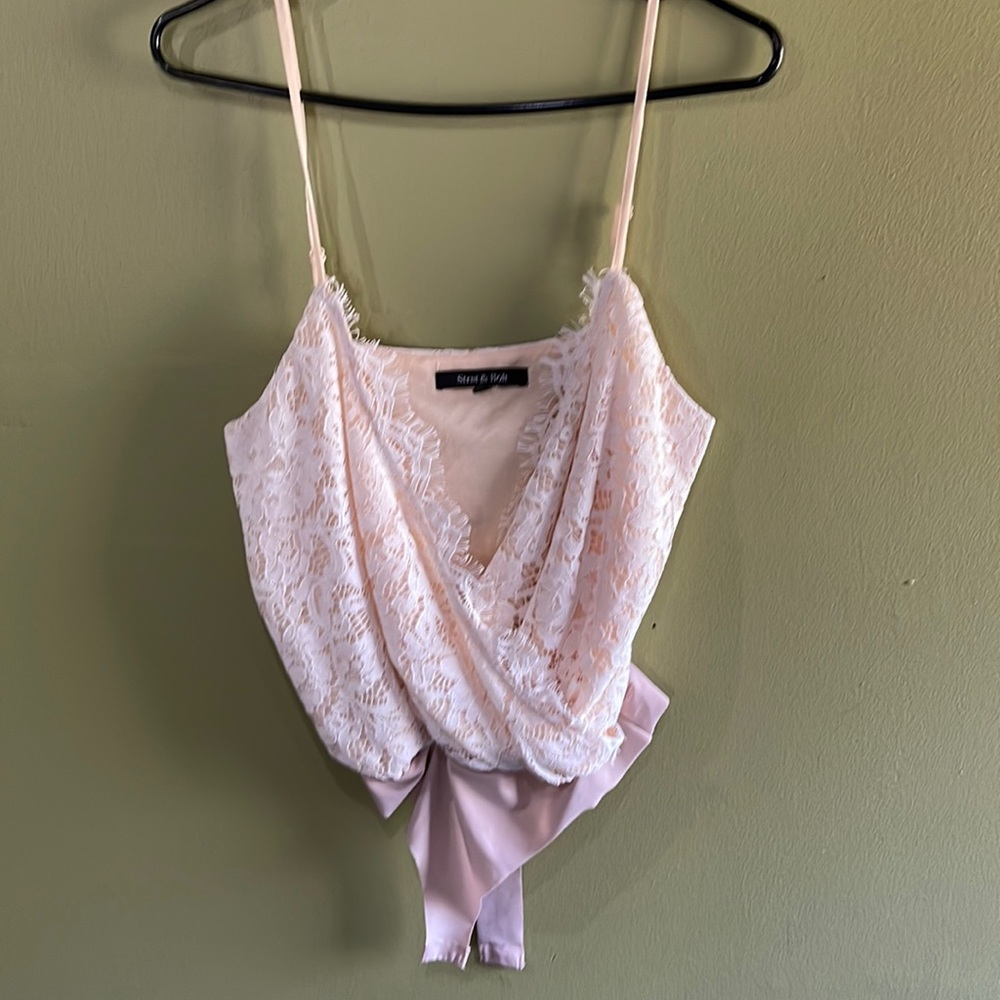 Lacy cream body suit